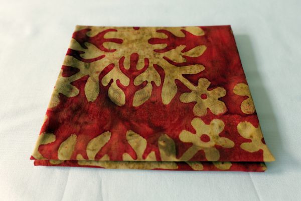 Red/Brown with a snowflake print - Hoffman Fabrics - Bali Batik Handprints