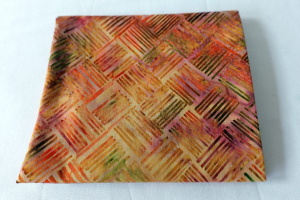 Orange and purple fabric with a line print - Hoffman Fabrics - Bali Batik Handprints – Sku 3343 308