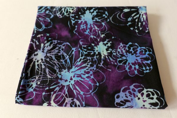 Purple fabric with a light blue floral print - Hoffman Fabrics - Bali Batik Handprints – Sku 3356 507