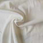 Linen Rayon blend dressmaking fabric in Off White